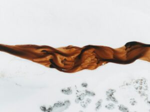 Aerial view of a meandering river in a snowy landscape for the data readiness report framework article