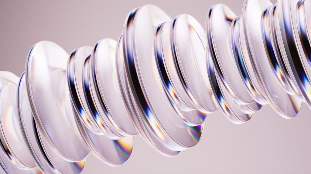 Anéis de vidro abstratos com refrações de luz arco-íris