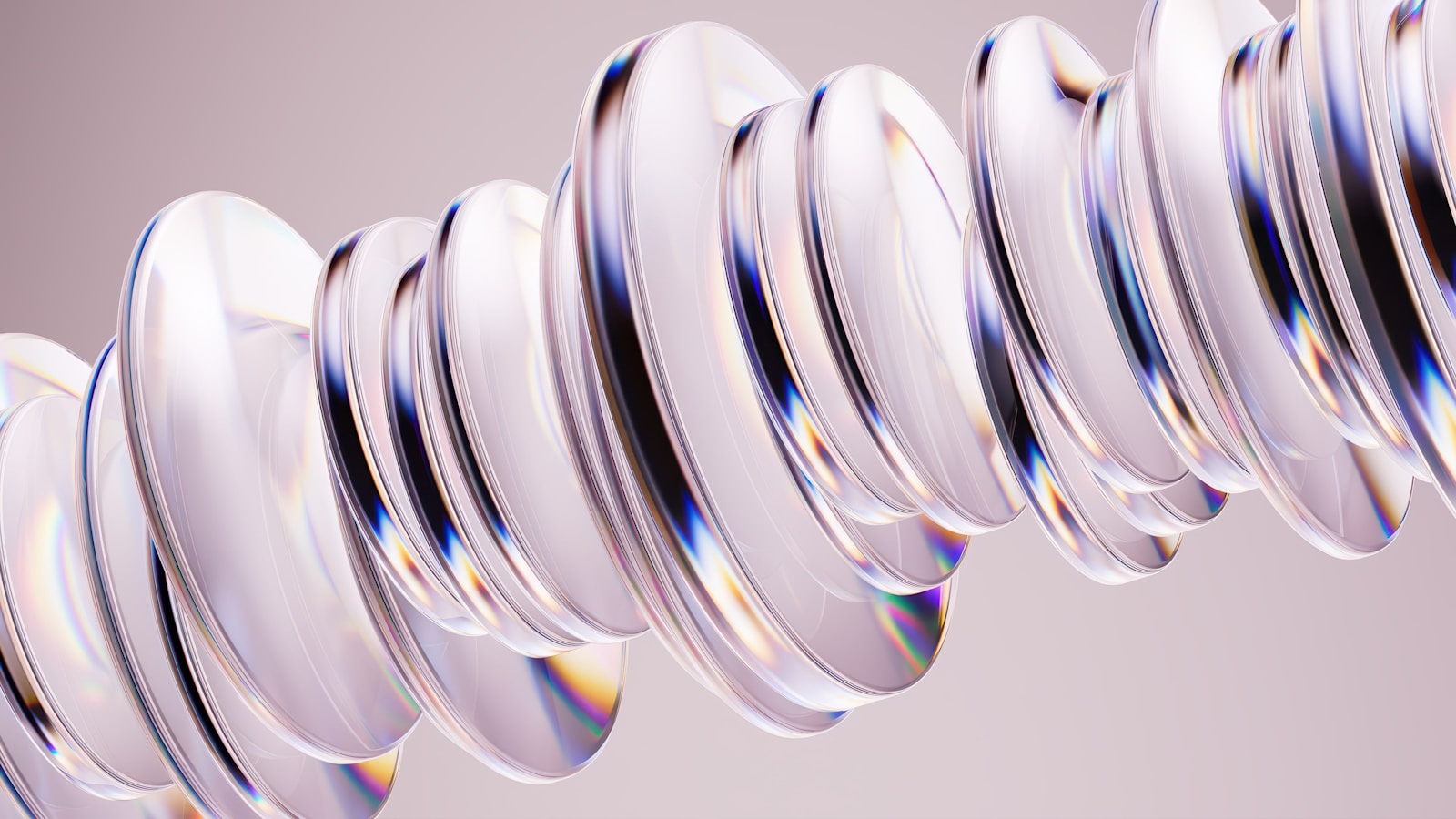 Anéis de vidro abstratos com refrações de luz arco-íris